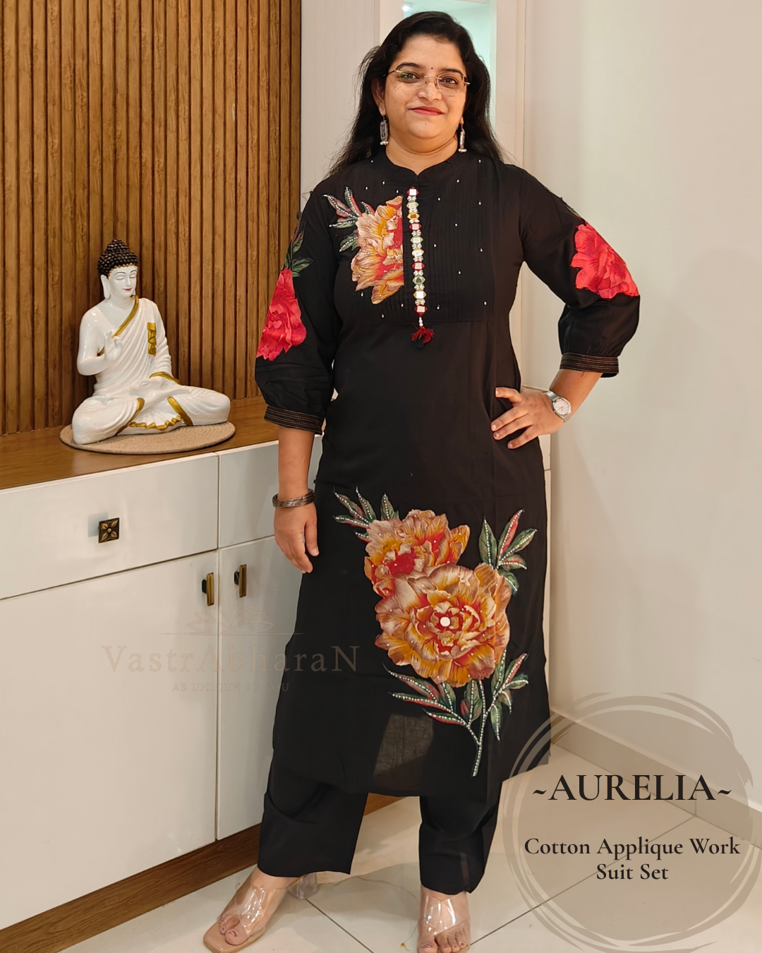 Black cotton top with 3/4 sleeves and applique work