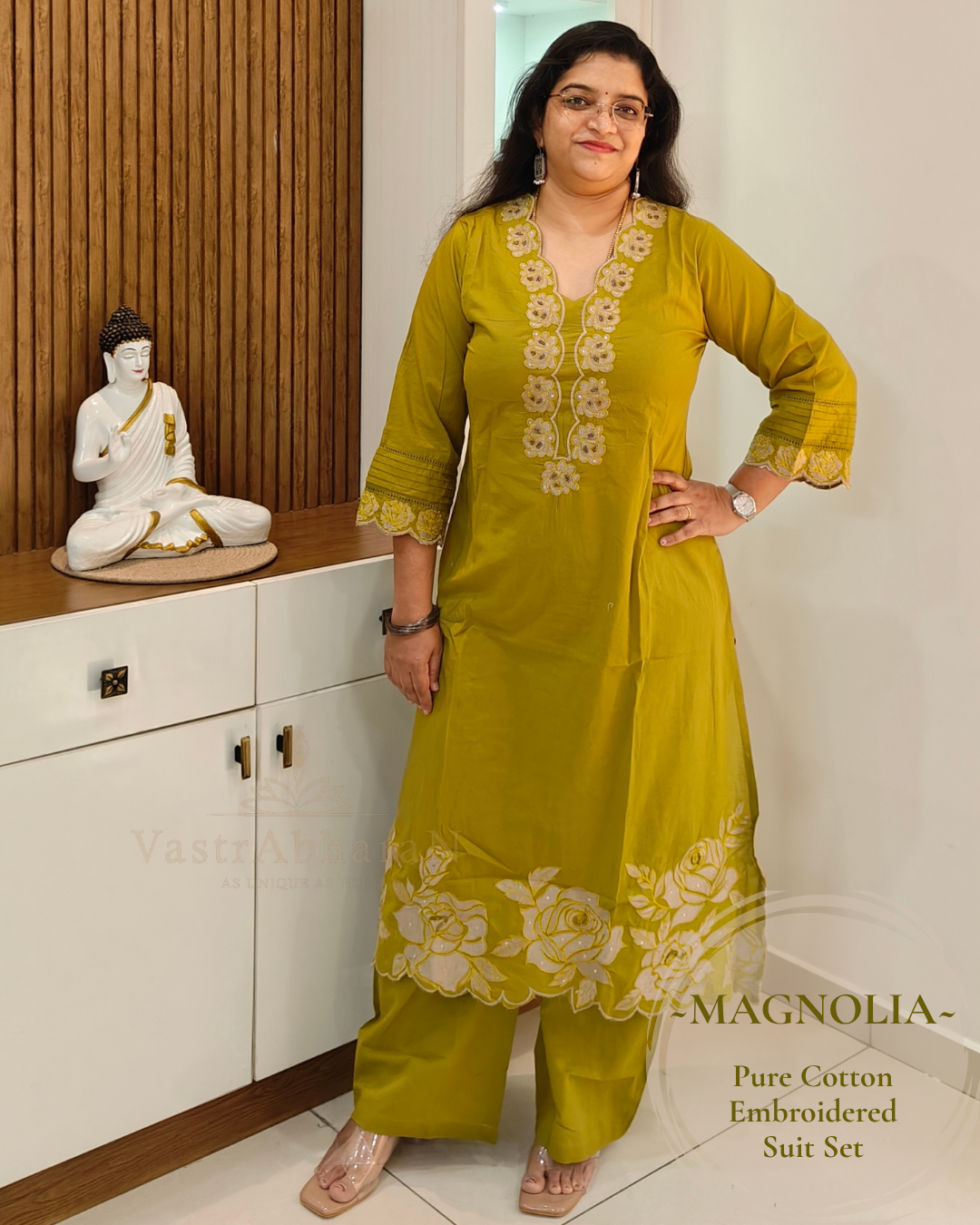 Green cotton top with 3/4 sleeves and floral embroidered cuffs