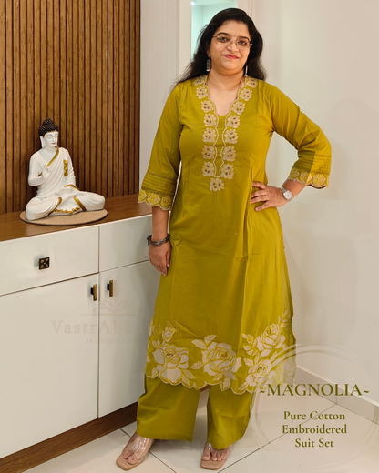 Green cotton top with 3/4 sleeves and floral embroidered cuffs
