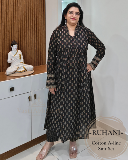 Black printed cotton top with full sleeves and border cuff